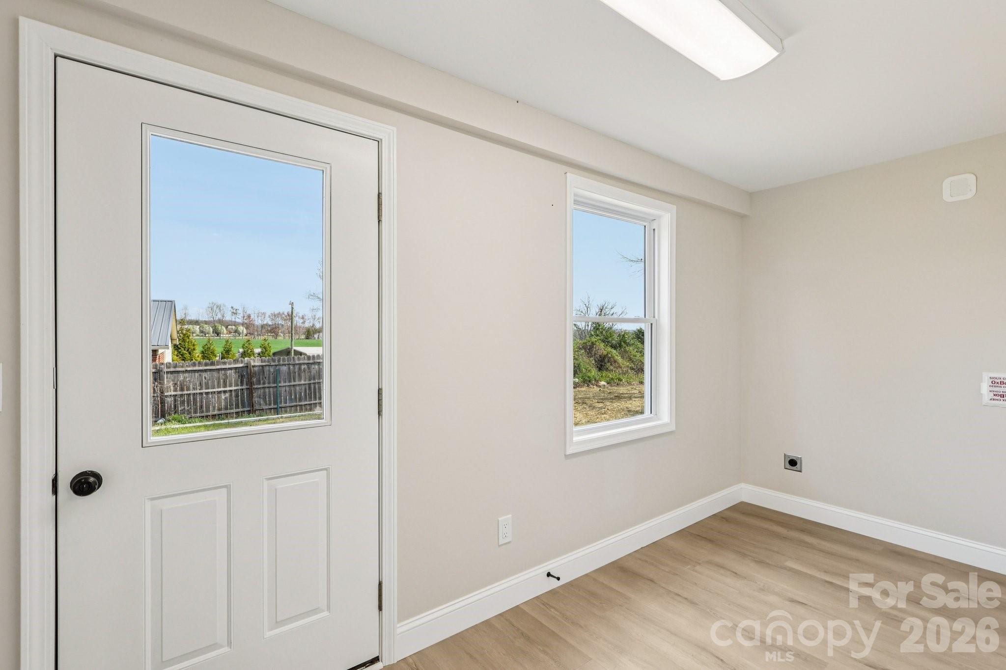 1403 Dudley Shoals Road Granite Falls, NC 28630 - Photo 13 of 20 a view of an empty room and window