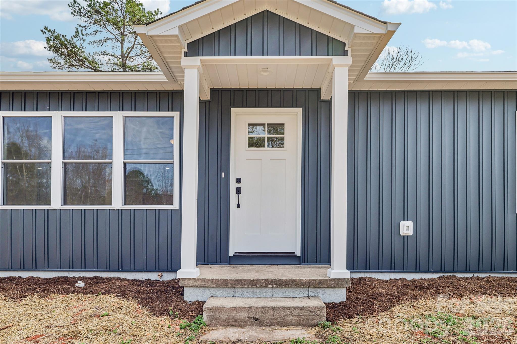 1403 Dudley Shoals Road Granite Falls, NC 28630 - Photo 2 of 20 a front view of a house