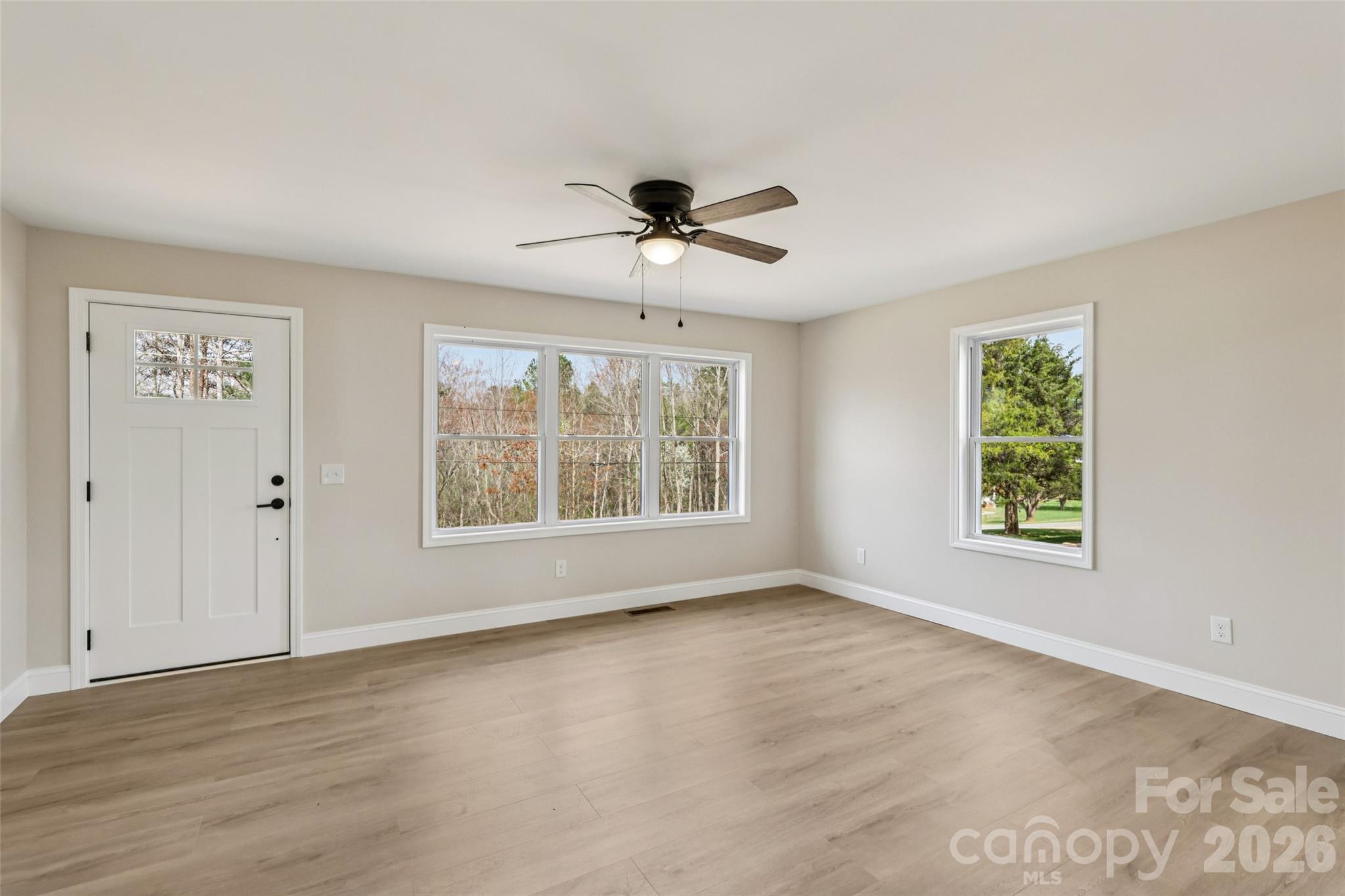 1403 Dudley Shoals Road Granite Falls, NC 28630 - Photo 4 of 20 a view of an empty room with a window