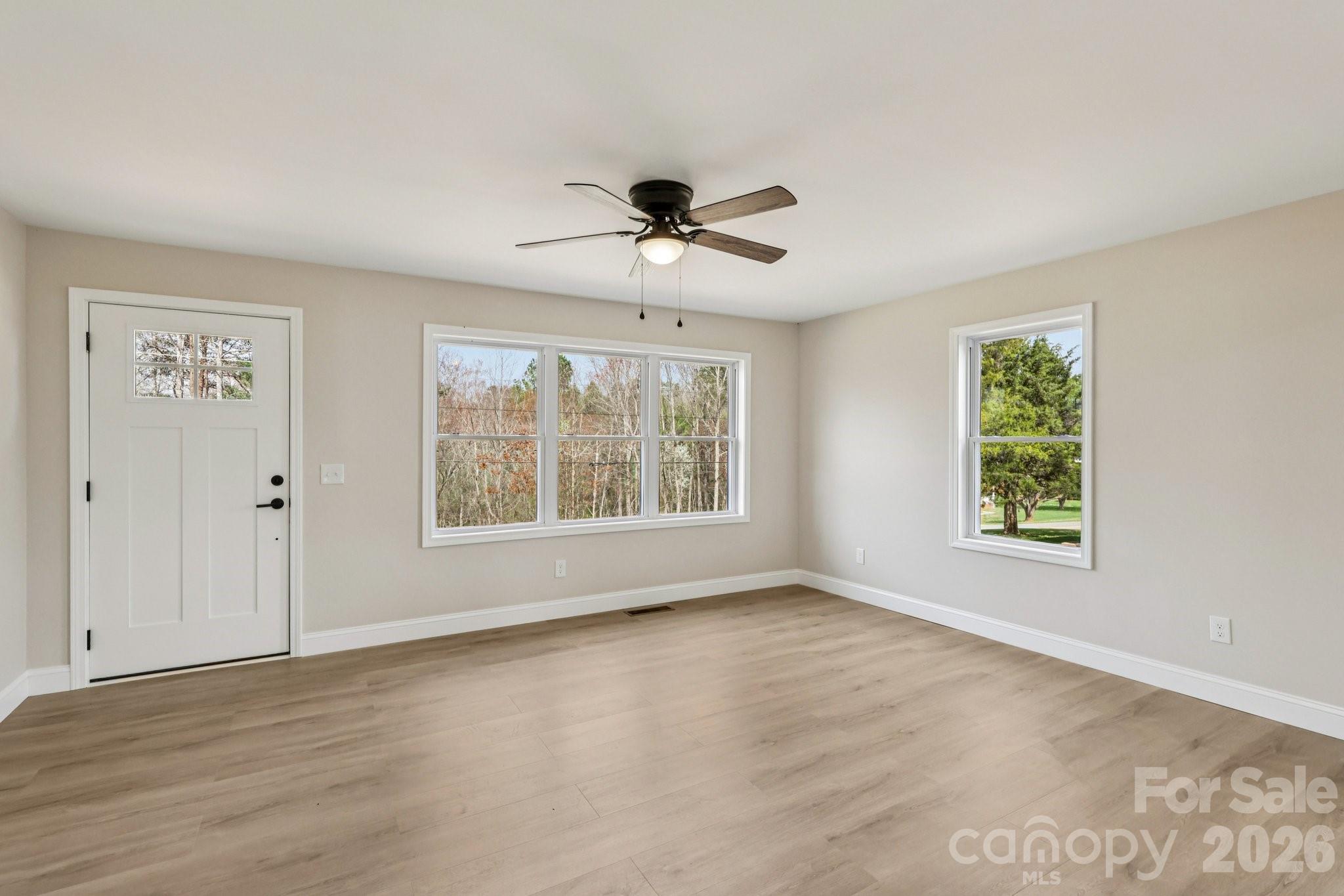 1403 Dudley Shoals Road Granite Falls, NC 28630 - Photo 5 of 20 a view of an empty room with a window