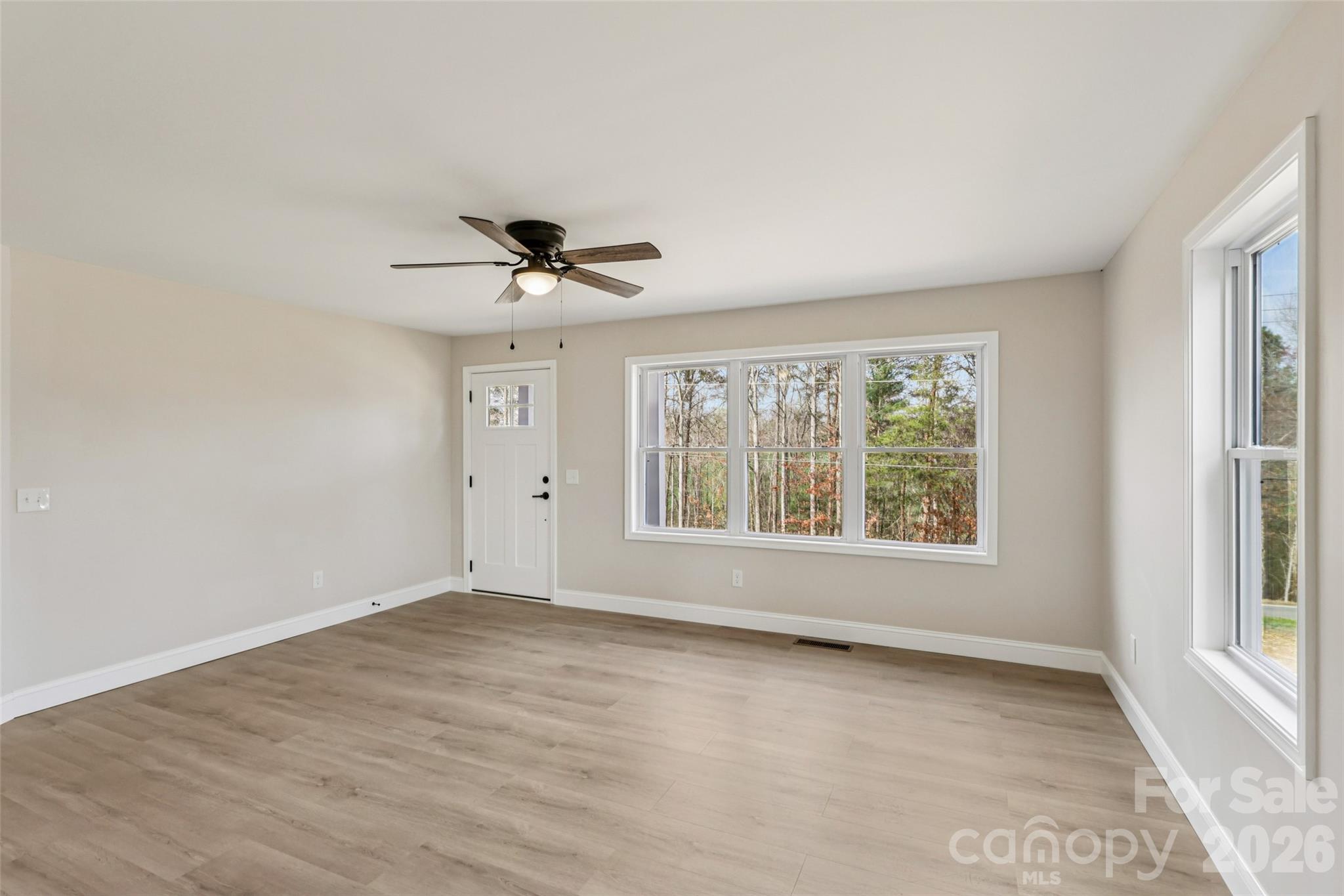 1403 Dudley Shoals Road Granite Falls, NC 28630 - Photo 6 of 20 a view of an empty room with a window