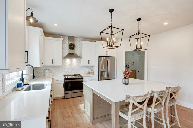 a bedroom with a bed and a ceiling fan