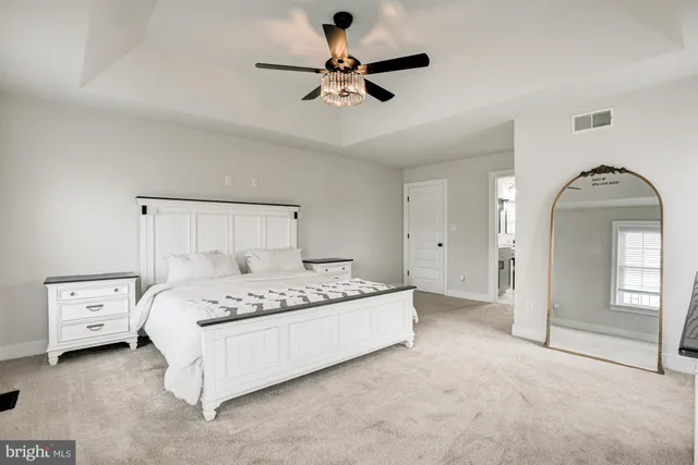 a bedroom with a bed and a with a tv