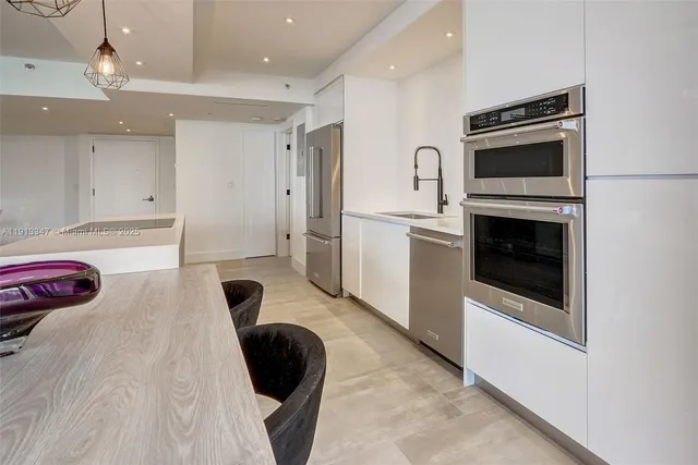 a bedroom with a bed and a walk in closet