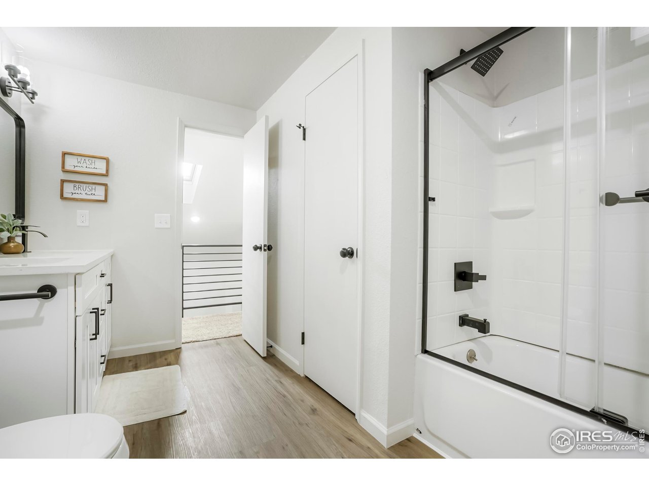 1356 Emery Street Longmont, CO 80501 - Photo 16 of 24 a view of a bathroom with a bathtub