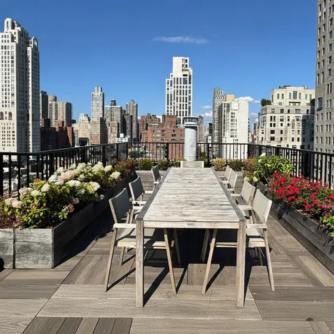 a view of a terrace with sitting area