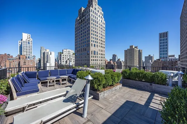 a view of a city with tall buildings