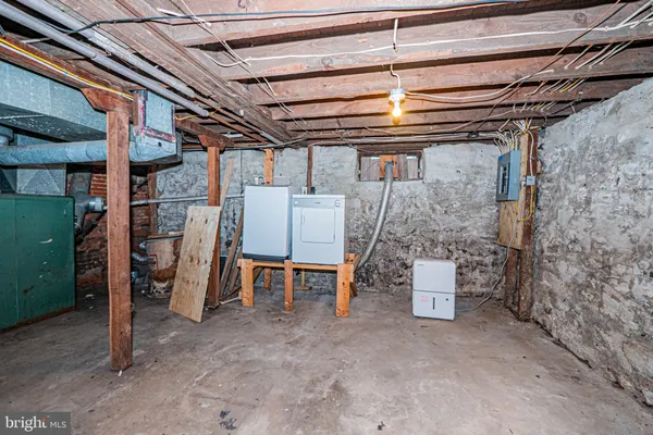 a view of a room with wooden walls