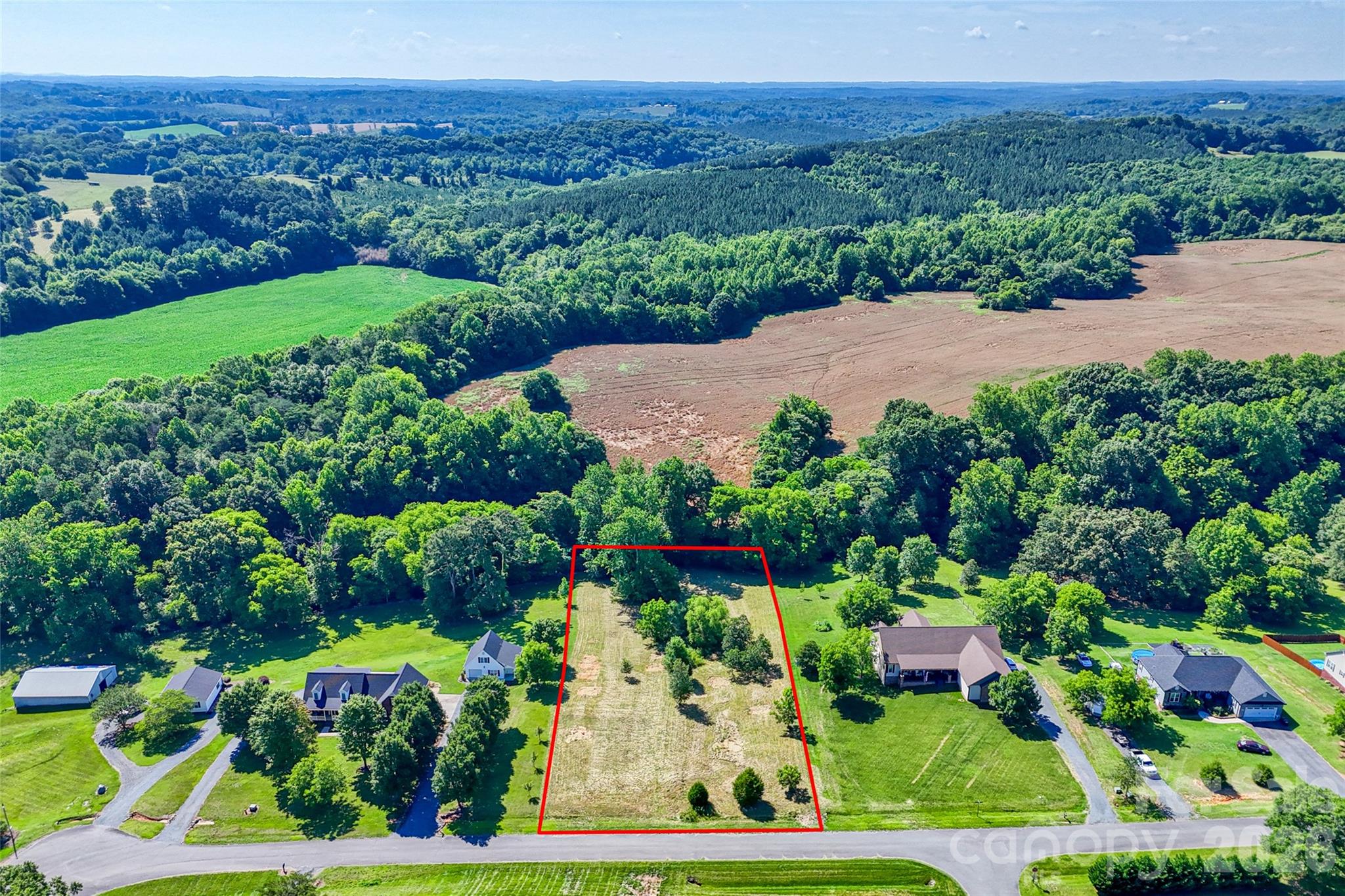 Lot 3 Crepts Branch Road, Unit 3 Locust, NC 28097 - Photo 21 of 36 a view of a garden with a lake