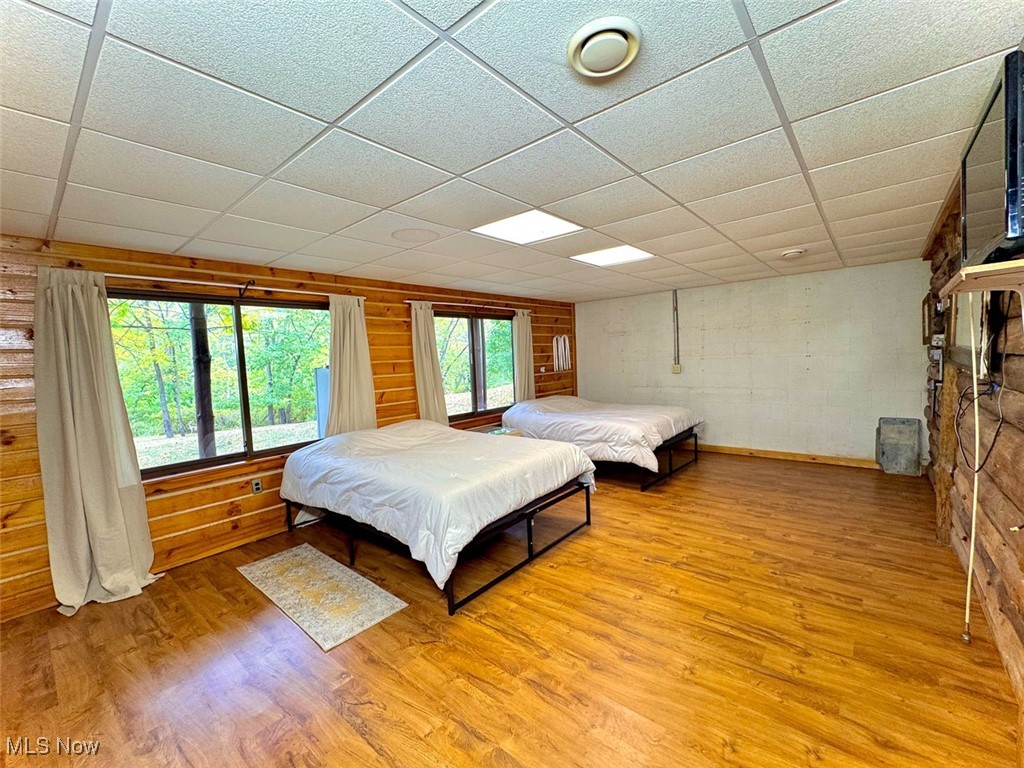 18063 Sligo Road Freeport, OH 43973 - Photo 45 of 50 Bedroom featuring a paneled ceiling and wood finished floors