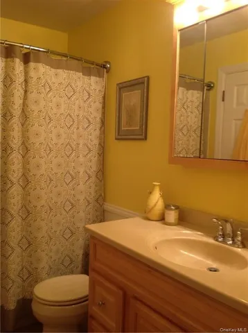 a bathroom with a sink and a shower