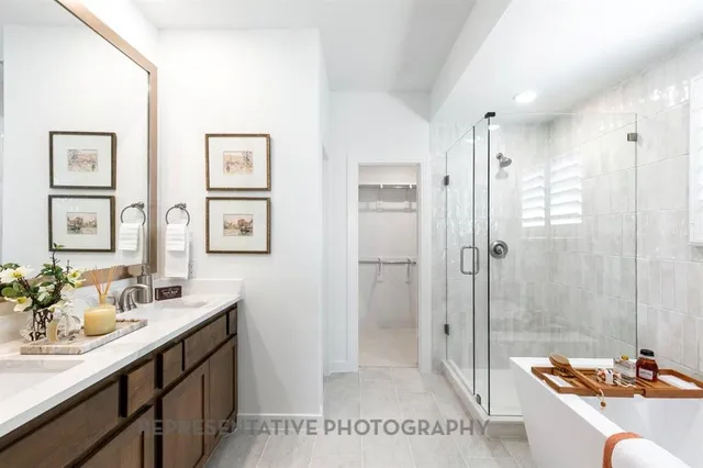 a bathroom with a double vanity sink mirror and double