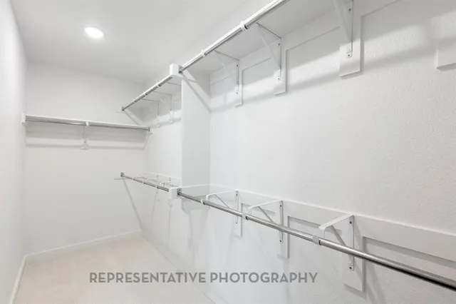 a view of a room with racks on the wall