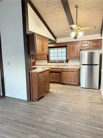 a bathroom with a sink a toilet and window