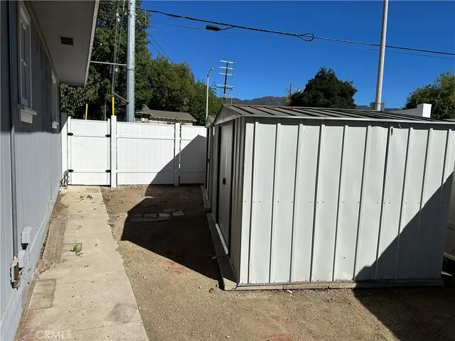 a view of balcony with furniture