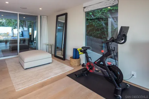 a view of a room with gym equipment