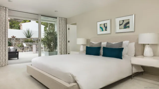 a bathroom with a sink double vanity and a mirror