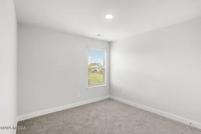 an empty room with window