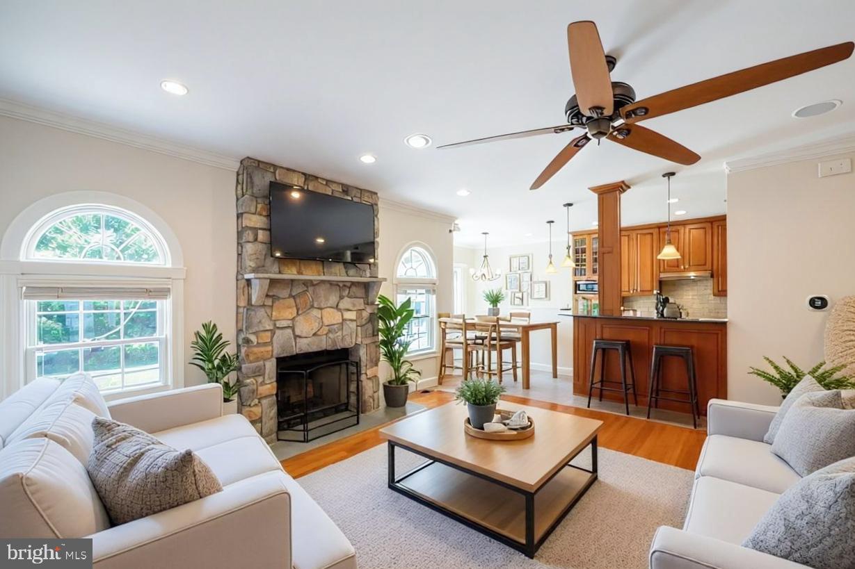 1060 West King Road Malvern, PA 19355 - Photo 15 of 90 a living room with furniture and a fireplace