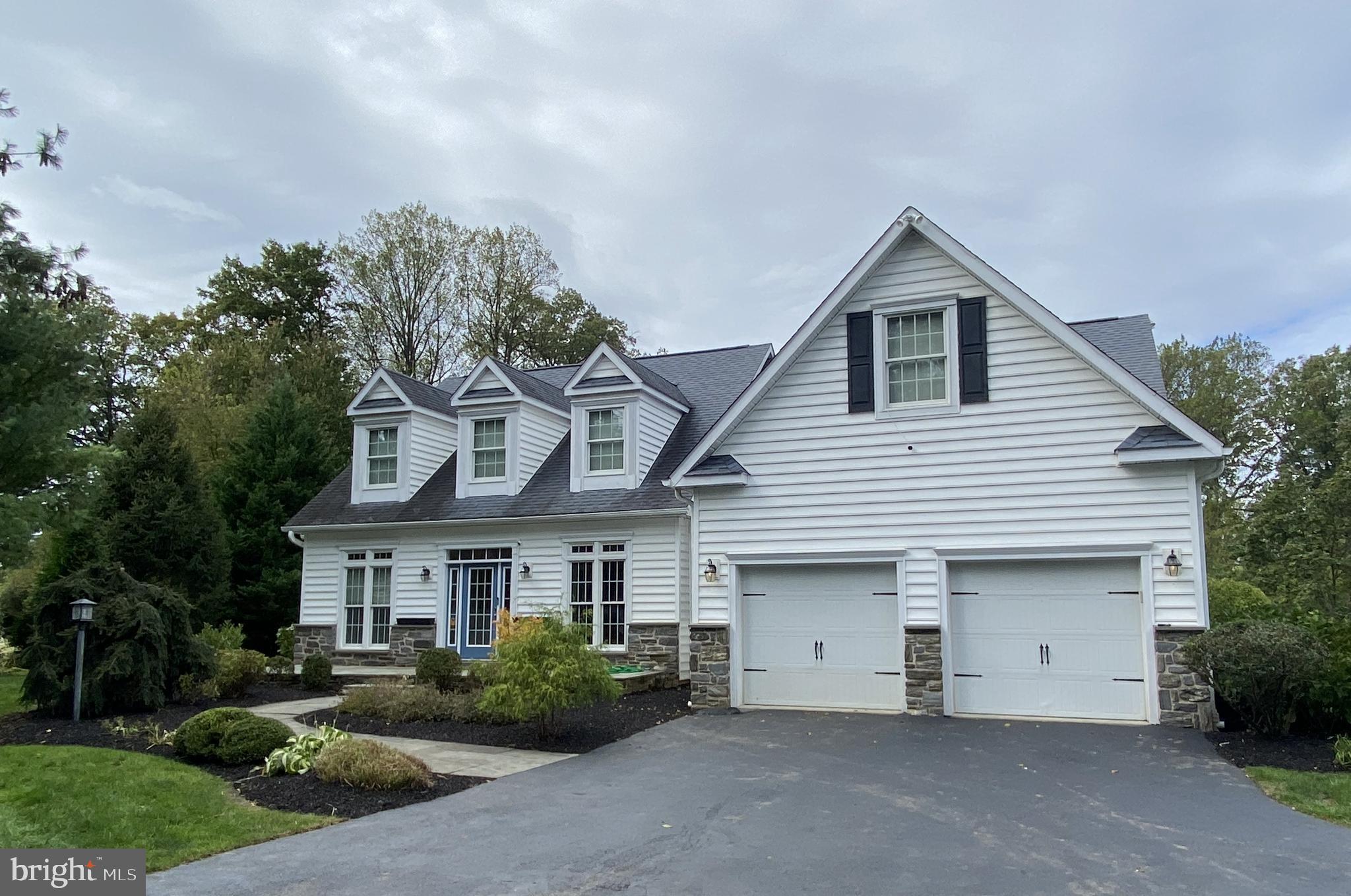 1060 West King Road Malvern, PA 19355 - Photo 2 of 90 a front view of a house with garden