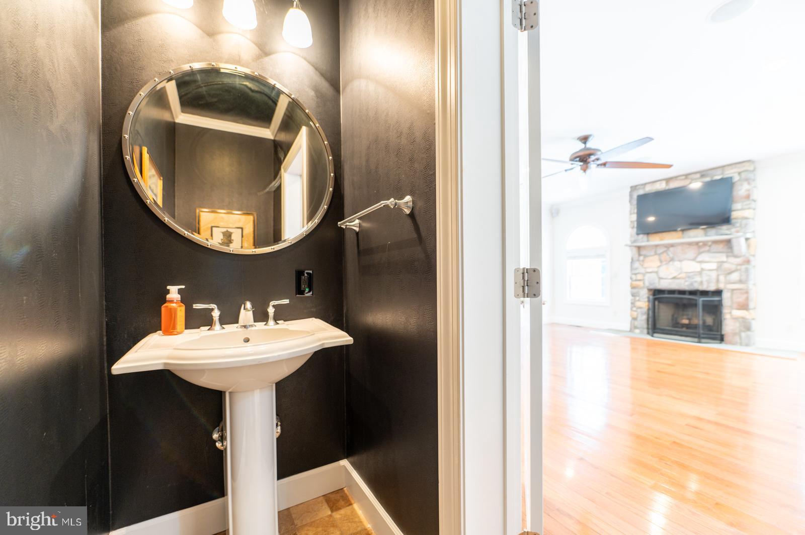 1060 West King Road Malvern, PA 19355 - Photo 29 of 90 a bathroom with a sink and a mirror