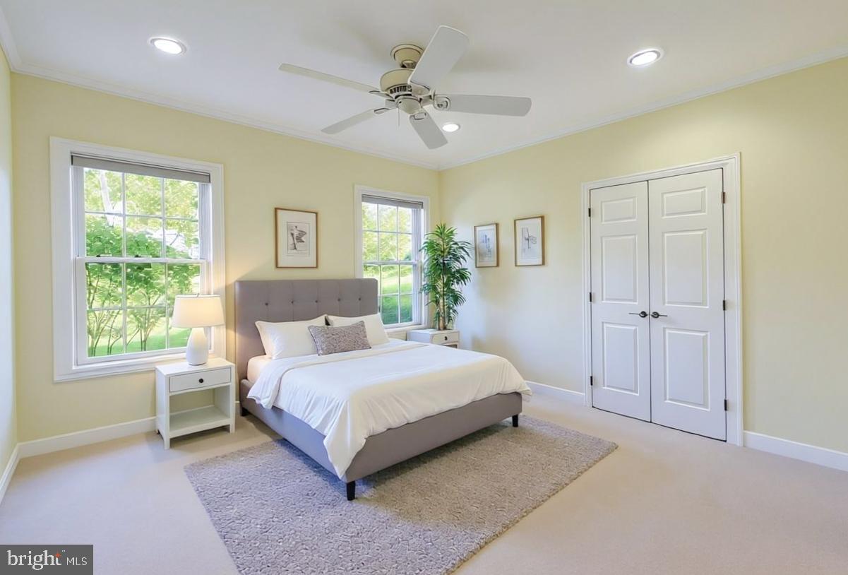 1060 West King Road Malvern, PA 19355 - Photo 58 of 90 a spacious bedroom with a bed and a window