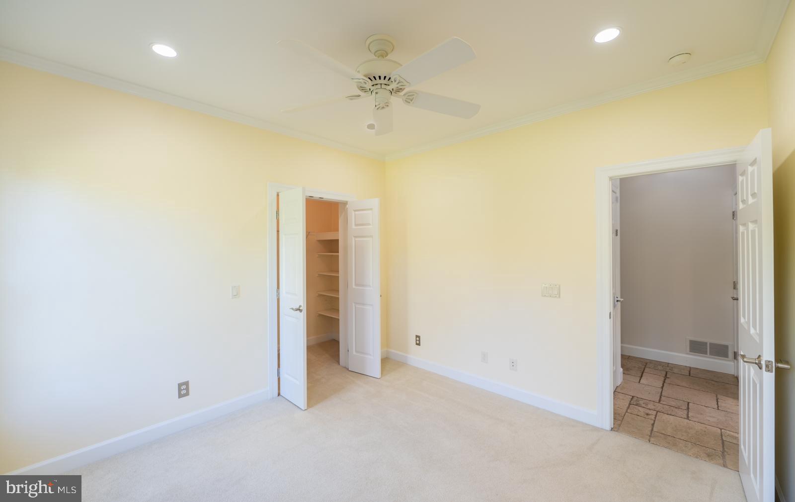 1060 West King Road Malvern, PA 19355 - Photo 59 of 90 an empty room with a ceiling fan and closet