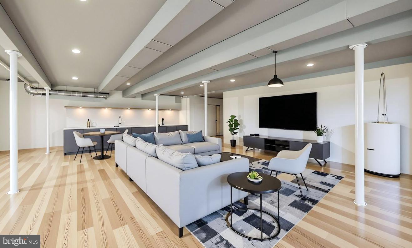1060 West King Road Malvern, PA 19355 - Photo 70 of 90 a living room with furniture wooden floor and a flat screen tv