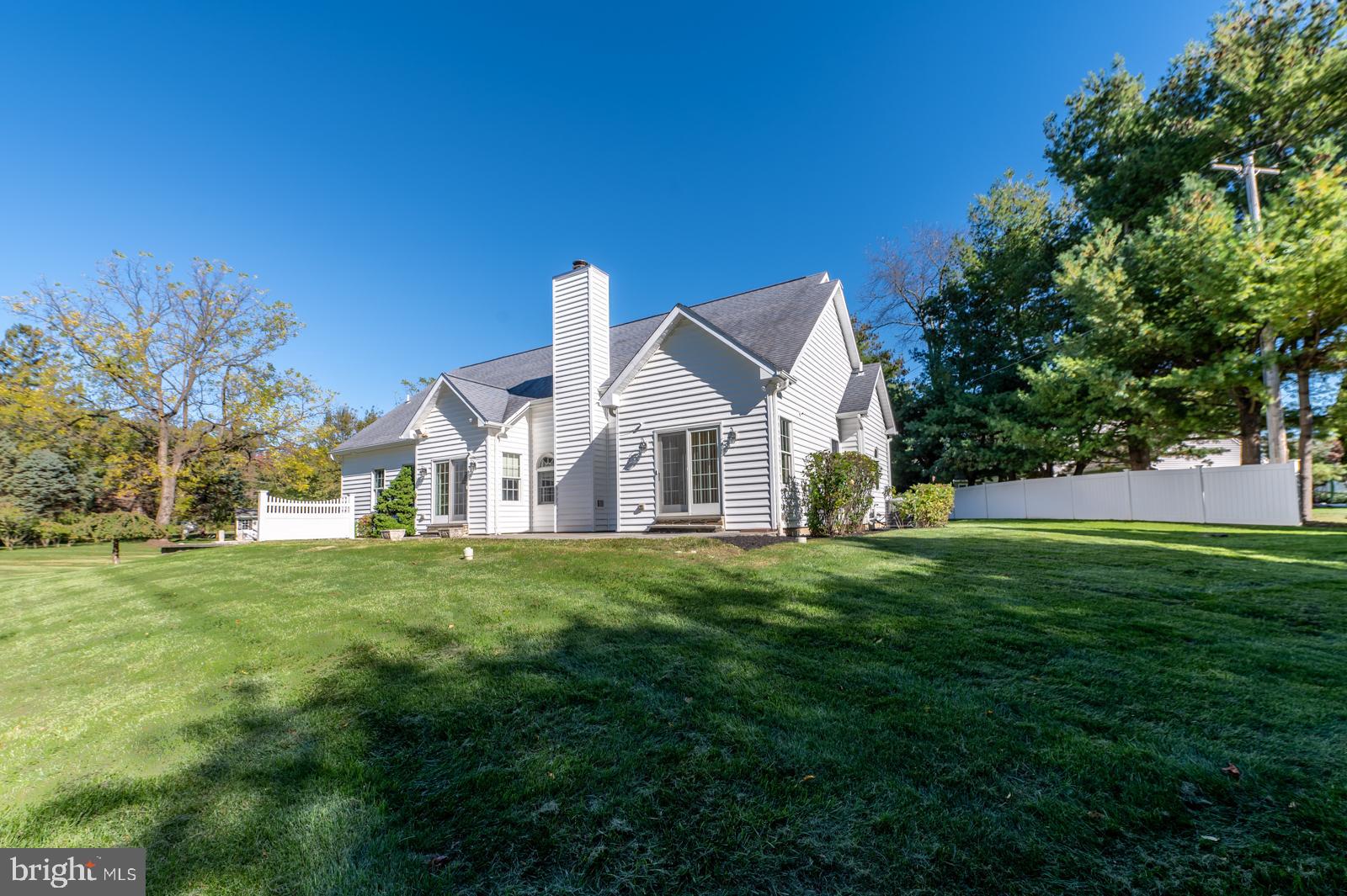 1060 West King Road Malvern, PA 19355 - Photo 80 of 90 a front view of a house with a garden