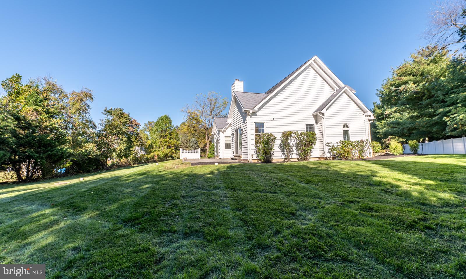 1060 West King Road Malvern, PA 19355 - Photo 85 of 90 a view of a house with a big yard and large trees