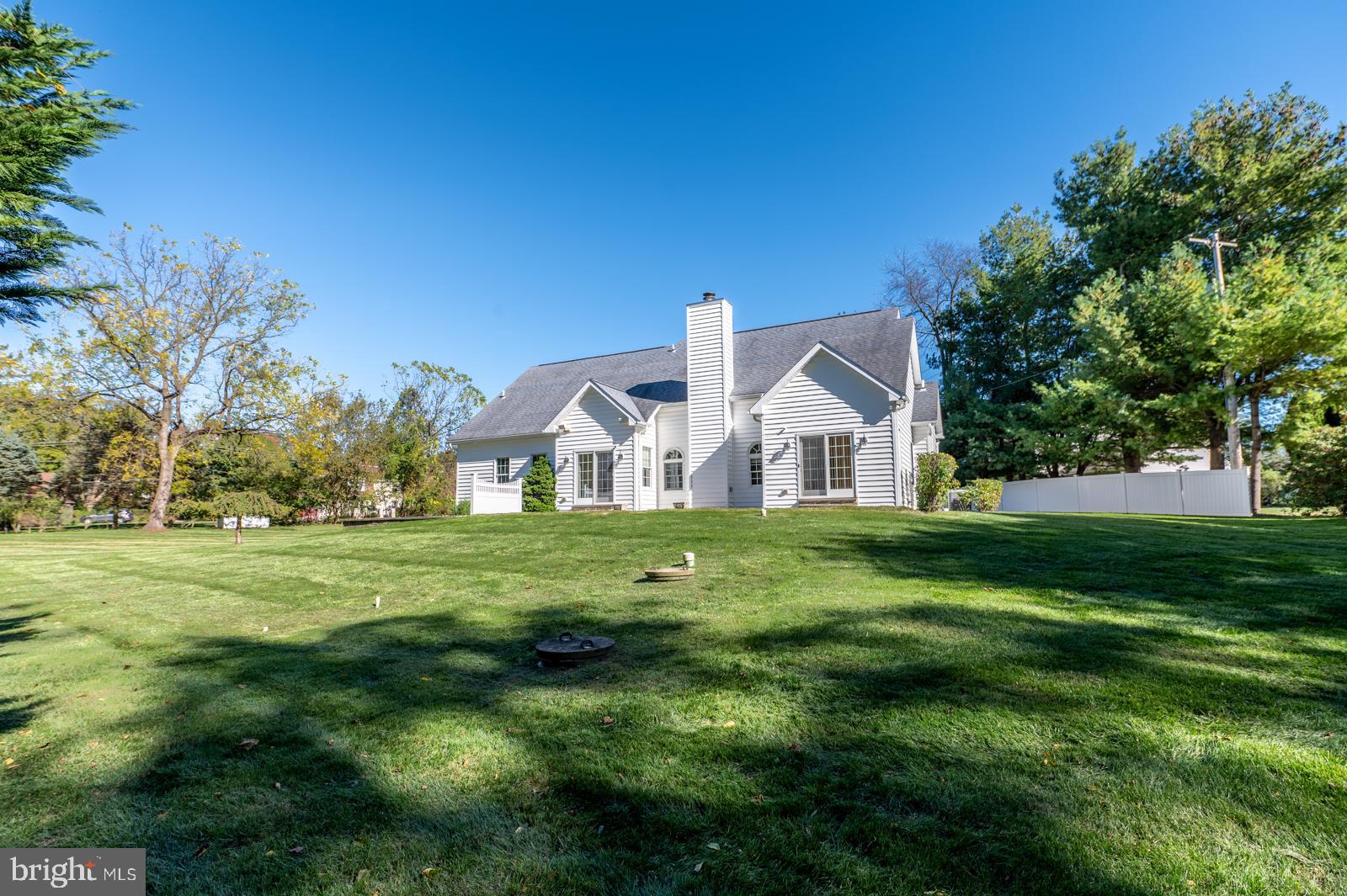 1060 West King Road Malvern, PA 19355 - Photo 87 of 90 a front view of a house with a big yard