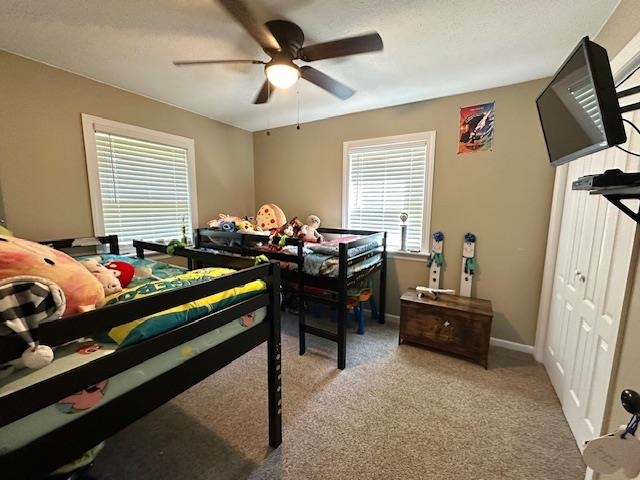 2082 Airport Ridge Road Linden, TN 37096 - Photo 17 of 29 a bed room with furniture and a window