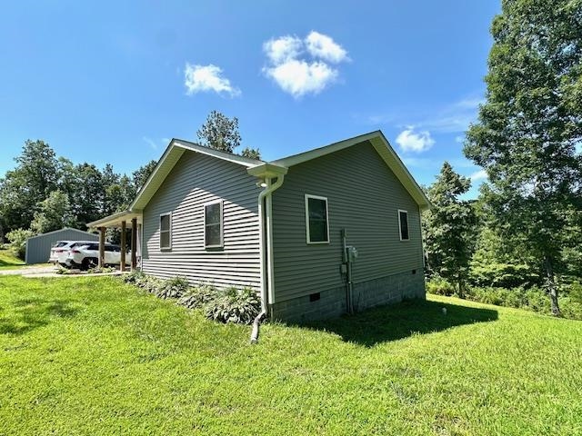 2082 Airport Ridge Road Linden, TN 37096 - Photo 21 of 29 a view of a house with a yard