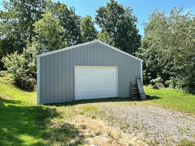 2082 Airport Ridge Road Linden, TN 37096 - Photo 25 of 29 a house with a yard