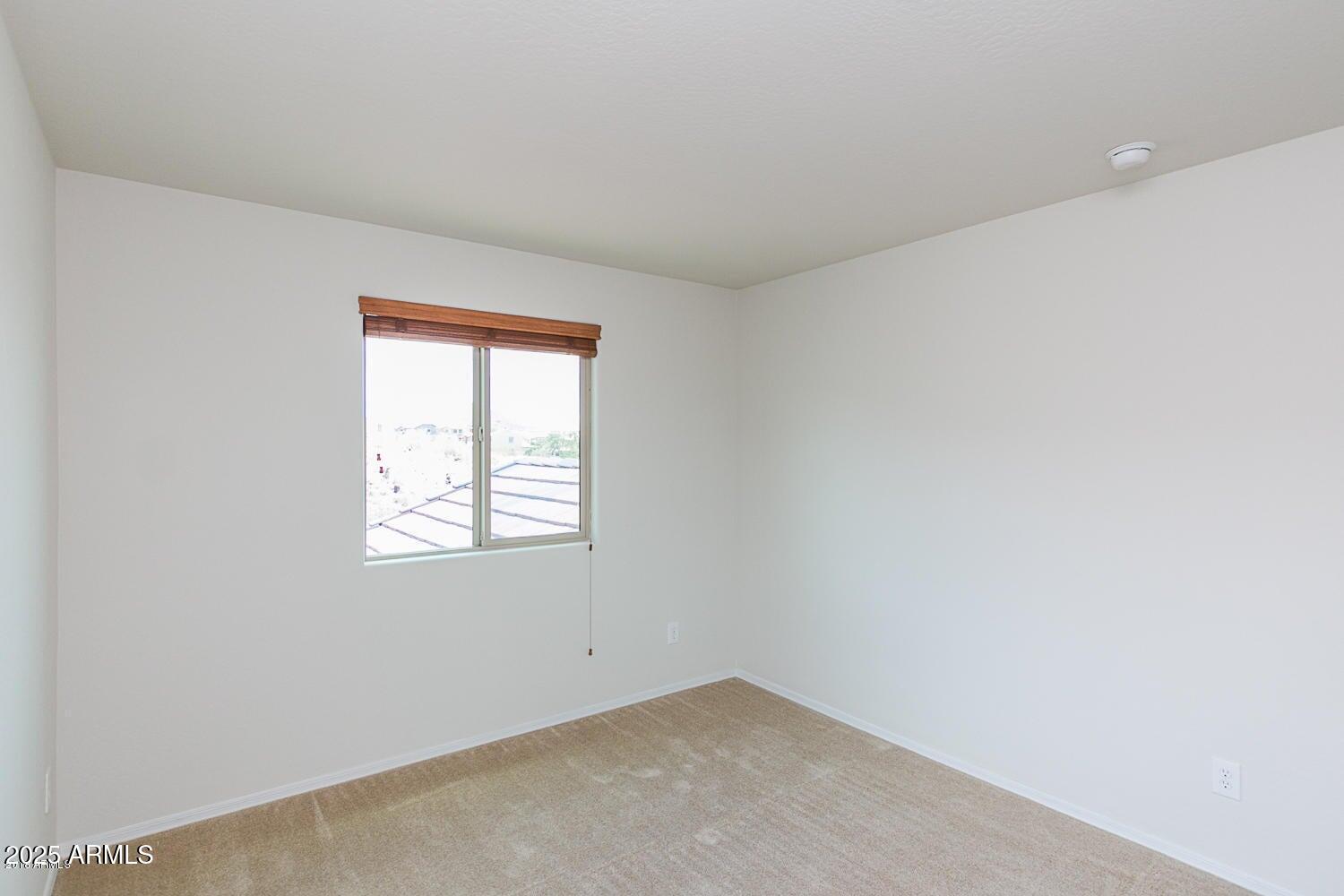26833 North 14th Lane Phoenix, AZ 85085 - Photo 23 of 55 an empty room with a window