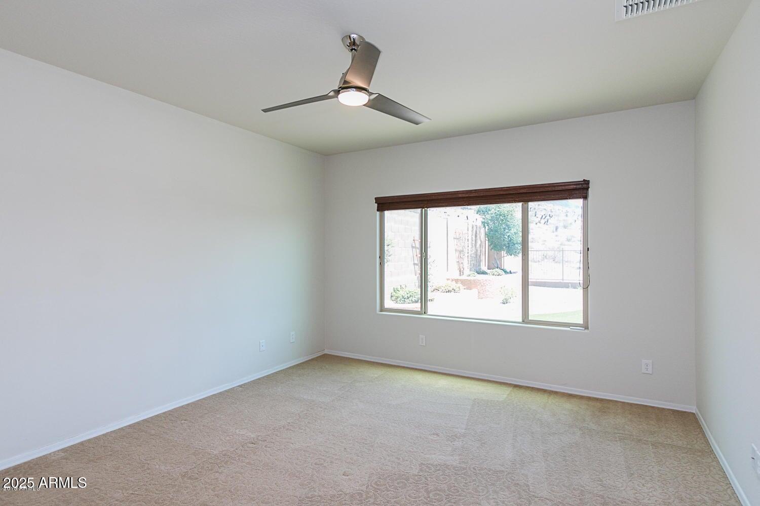 26833 North 14th Lane Phoenix, AZ 85085 - Photo 24 of 55 an empty room with a window
