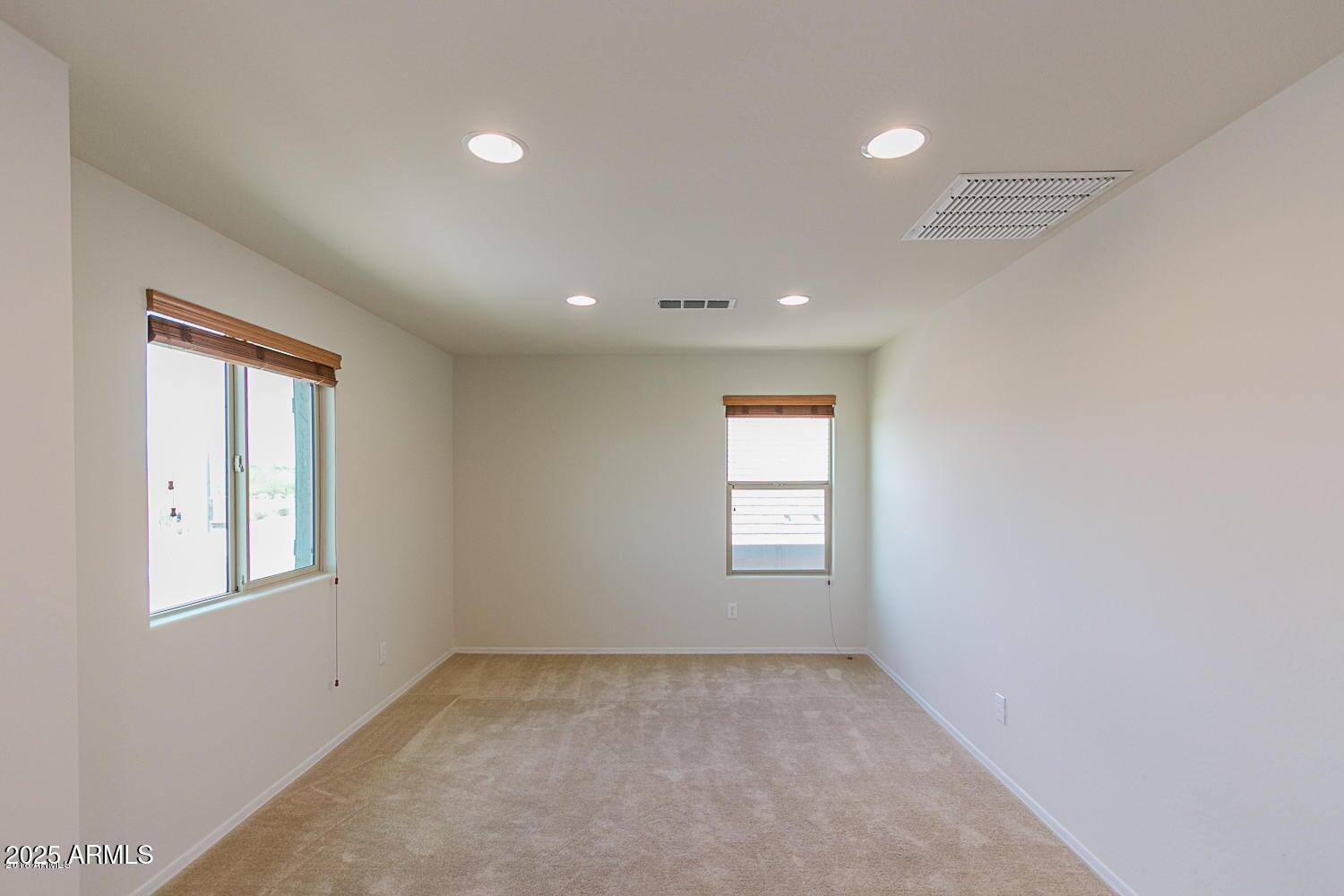 26833 North 14th Lane Phoenix, AZ 85085 - Photo 28 of 55 an empty room with windows
