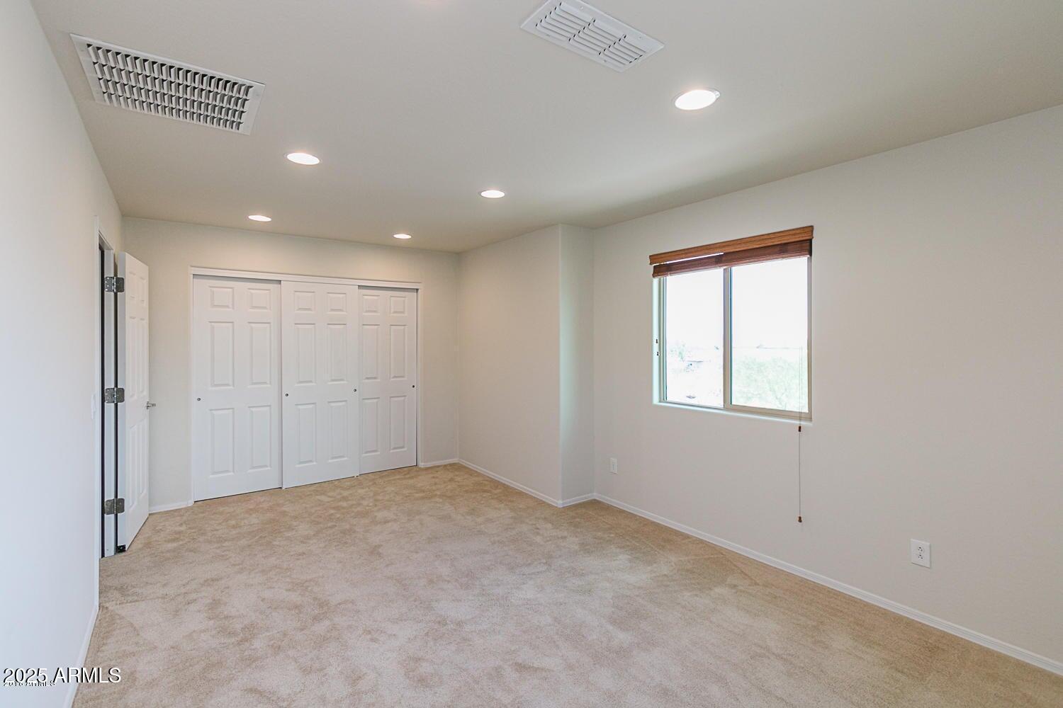 26833 North 14th Lane Phoenix, AZ 85085 - Photo 29 of 55 an empty room with windows