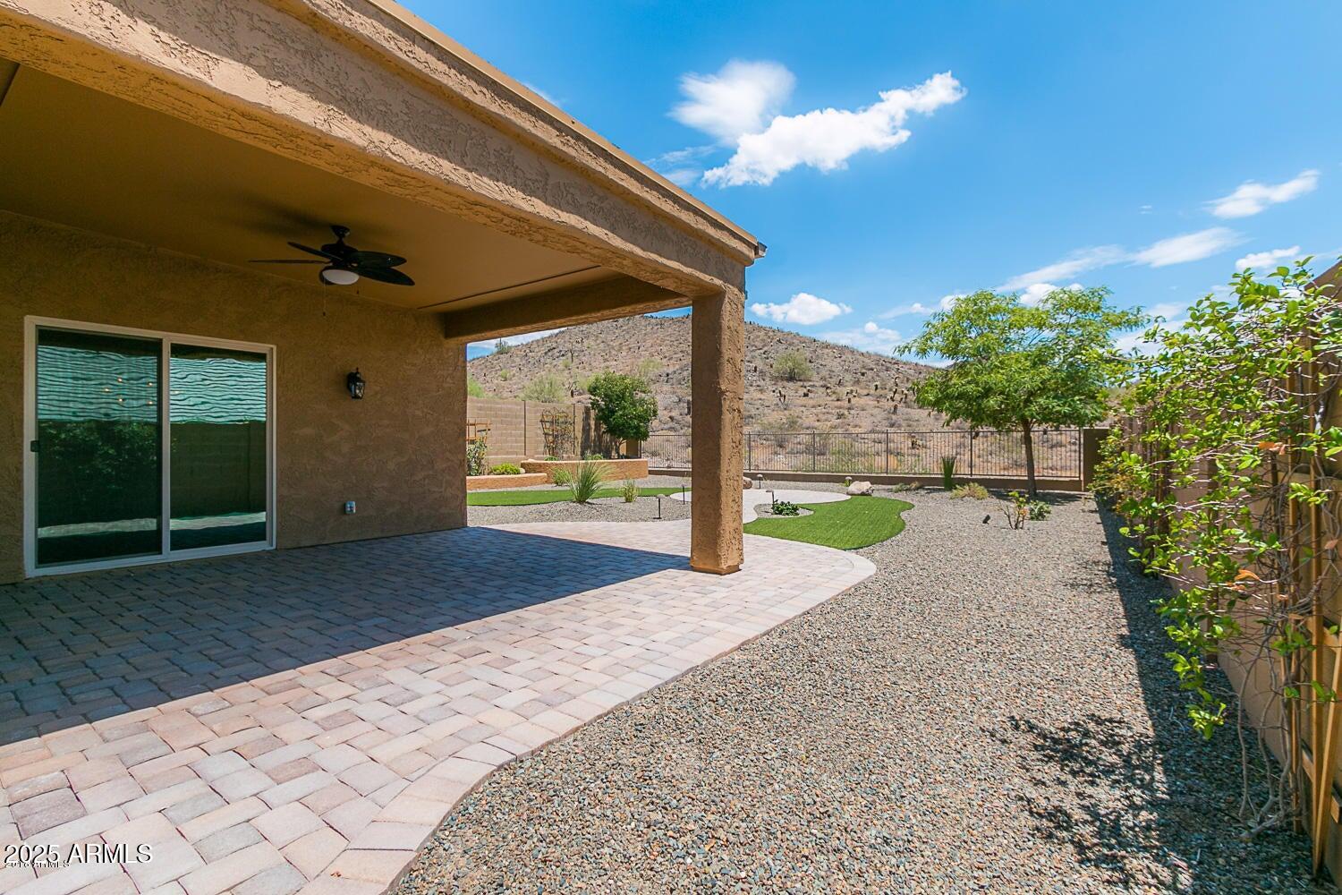 26833 North 14th Lane Phoenix, AZ 85085 - Photo 37 of 55 a view of a house with backyard and a garden