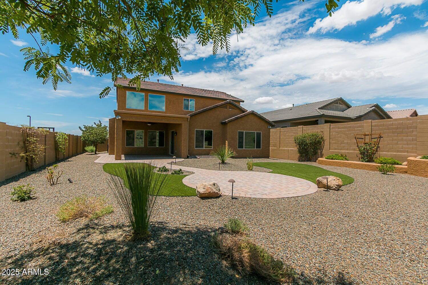 26833 North 14th Lane Phoenix, AZ 85085 - Photo 40 of 55 a front view of a house with a yard