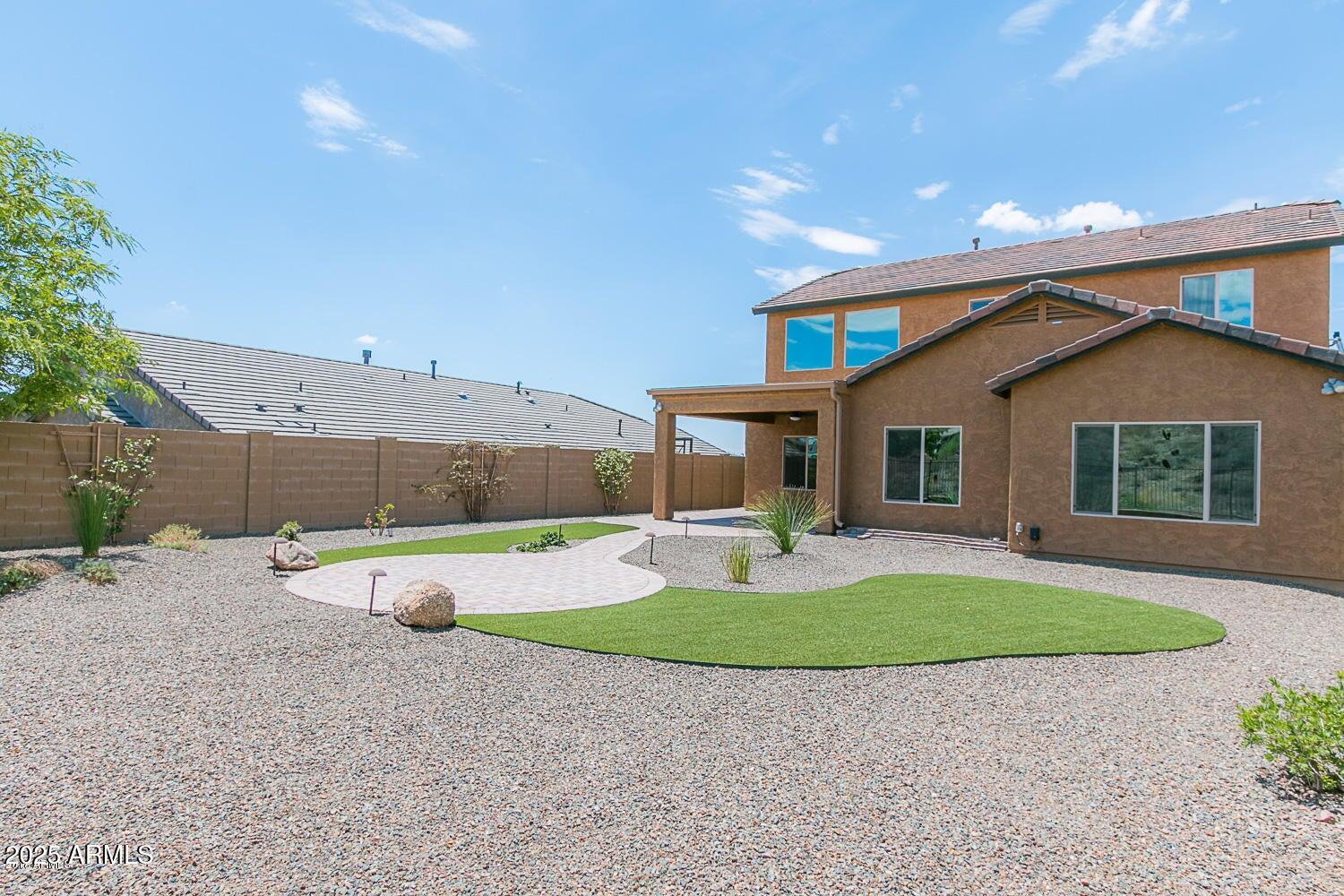 26833 North 14th Lane Phoenix, AZ 85085 - Photo 41 of 55 a view of a house with backyard and sitting area