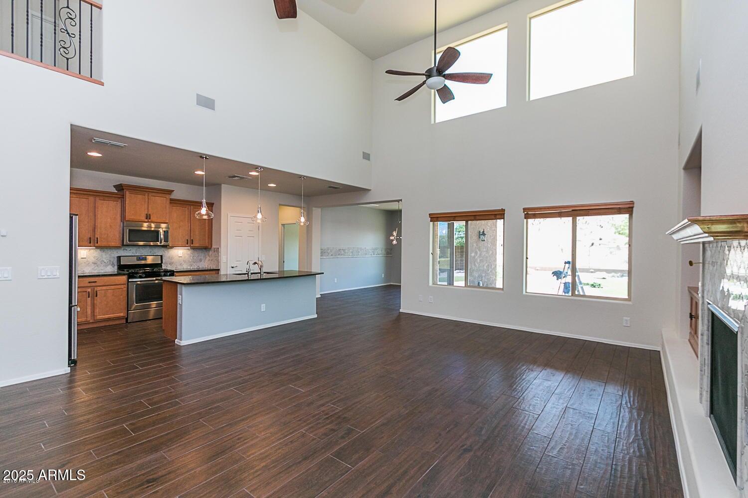 26833 North 14th Lane Phoenix, AZ 85085 - Photo 6 of 55 a view of kitchen with cabinets and wooden floor