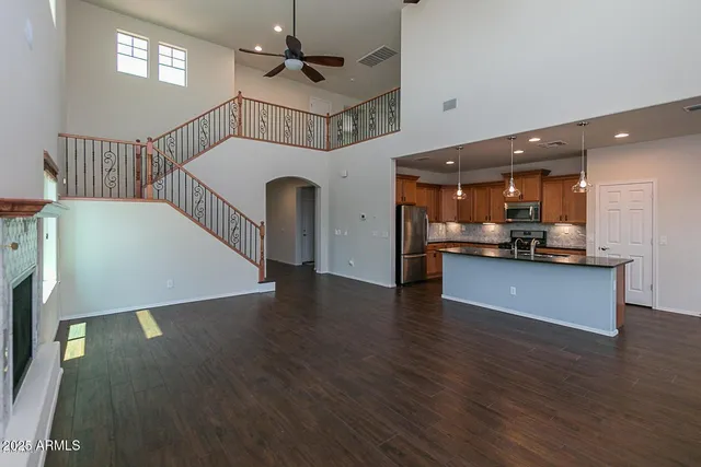 a view of kitchen with furniture and wooden floor