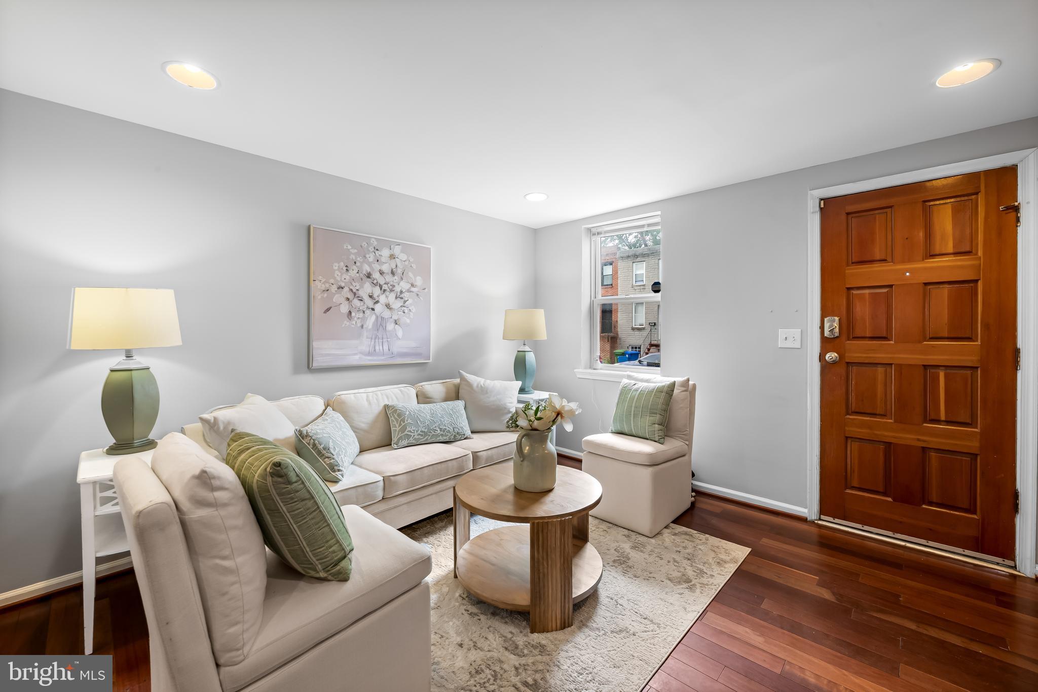 915 Ramsay Street Baltimore, MD 21223 - Photo 5 of 36 Living room w/recessed lights, nice wood front dr