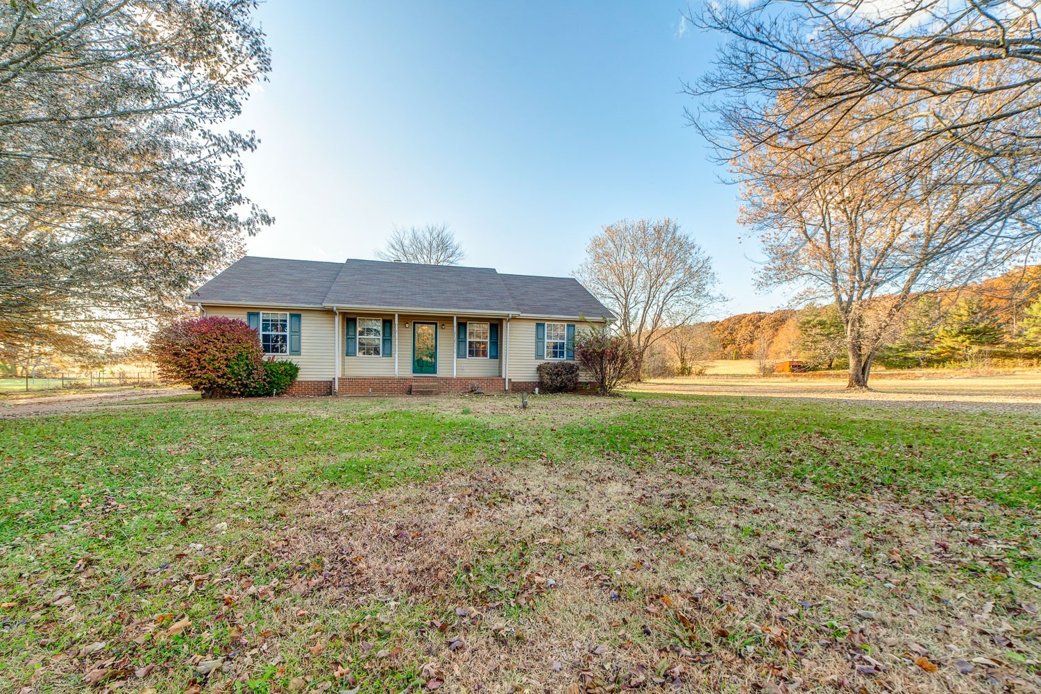 7481 Deer Ridge Road Primm Springs, TN 38476 - Photo 3 of 34 a view of a house with yard and tree s