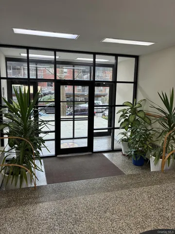 a view of a hallway with entryway