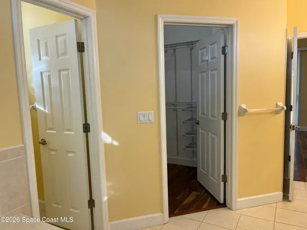 a view of a bathroom from a bathroom