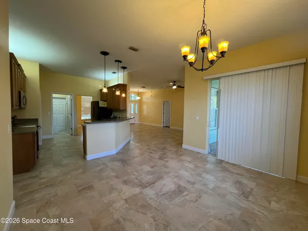 a view of a livingroom with a chandelier
