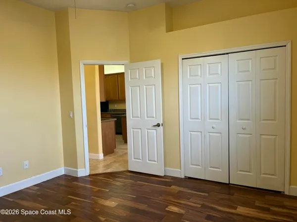 a view of a bathroom from a hallway