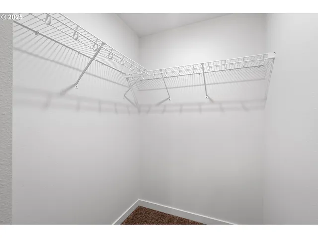 a bathroom with a toilet sink and shower